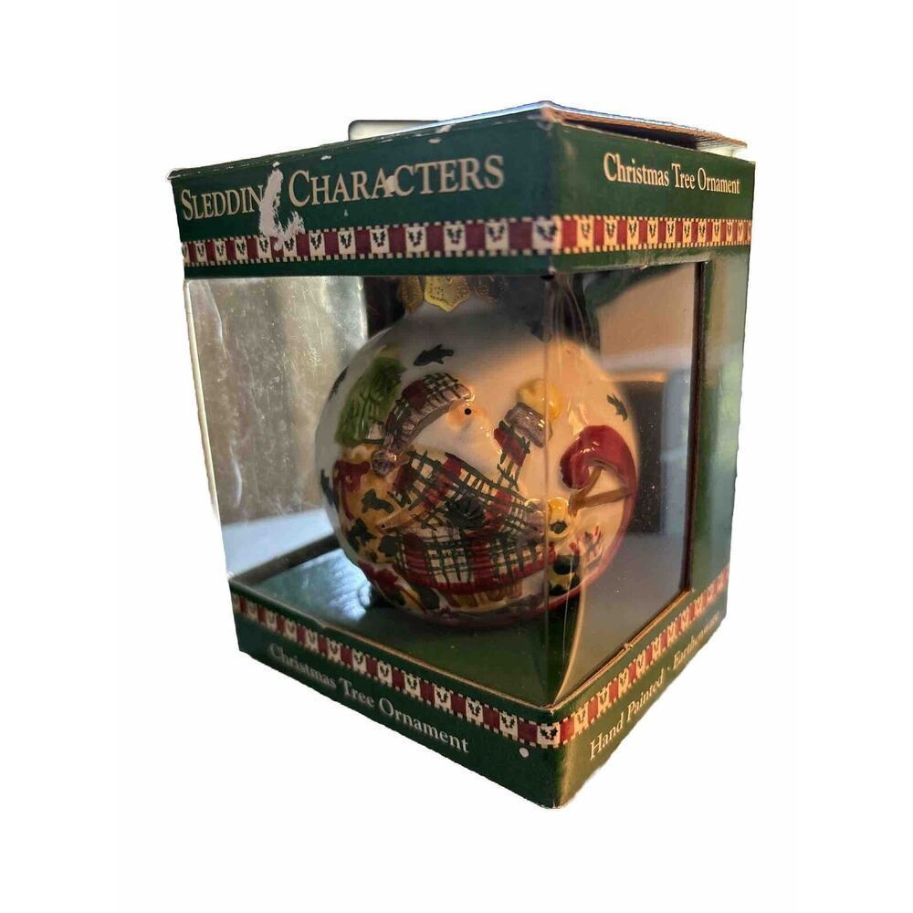 Debbie Mumm Santa Christmas Tree Ornament Ceramic sledding